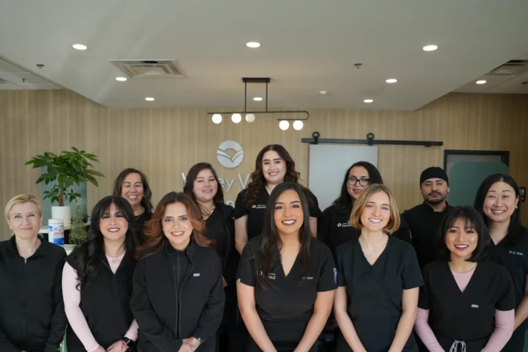 Dental team posing in office